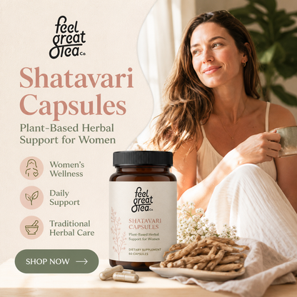 Woman holding a cup with 'feel great tea' Shatavari Capsules and packaging on a table.